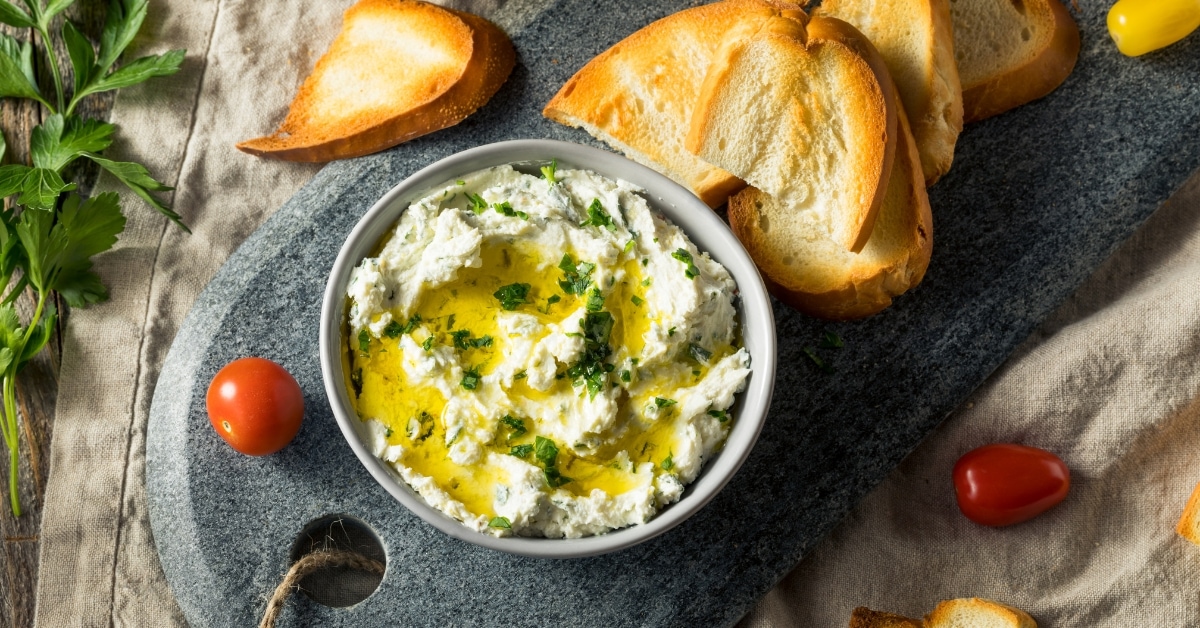 Bowl of Goat Cheese with Herbs and Bread