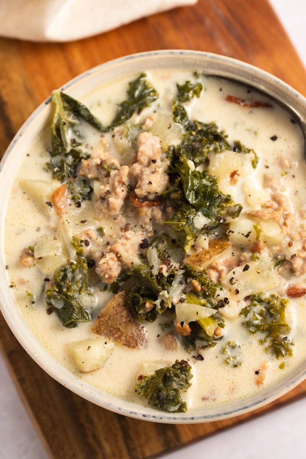 Bowl of Homemade Zuppa Toscana Soup with Kale, Sausage and Bacon