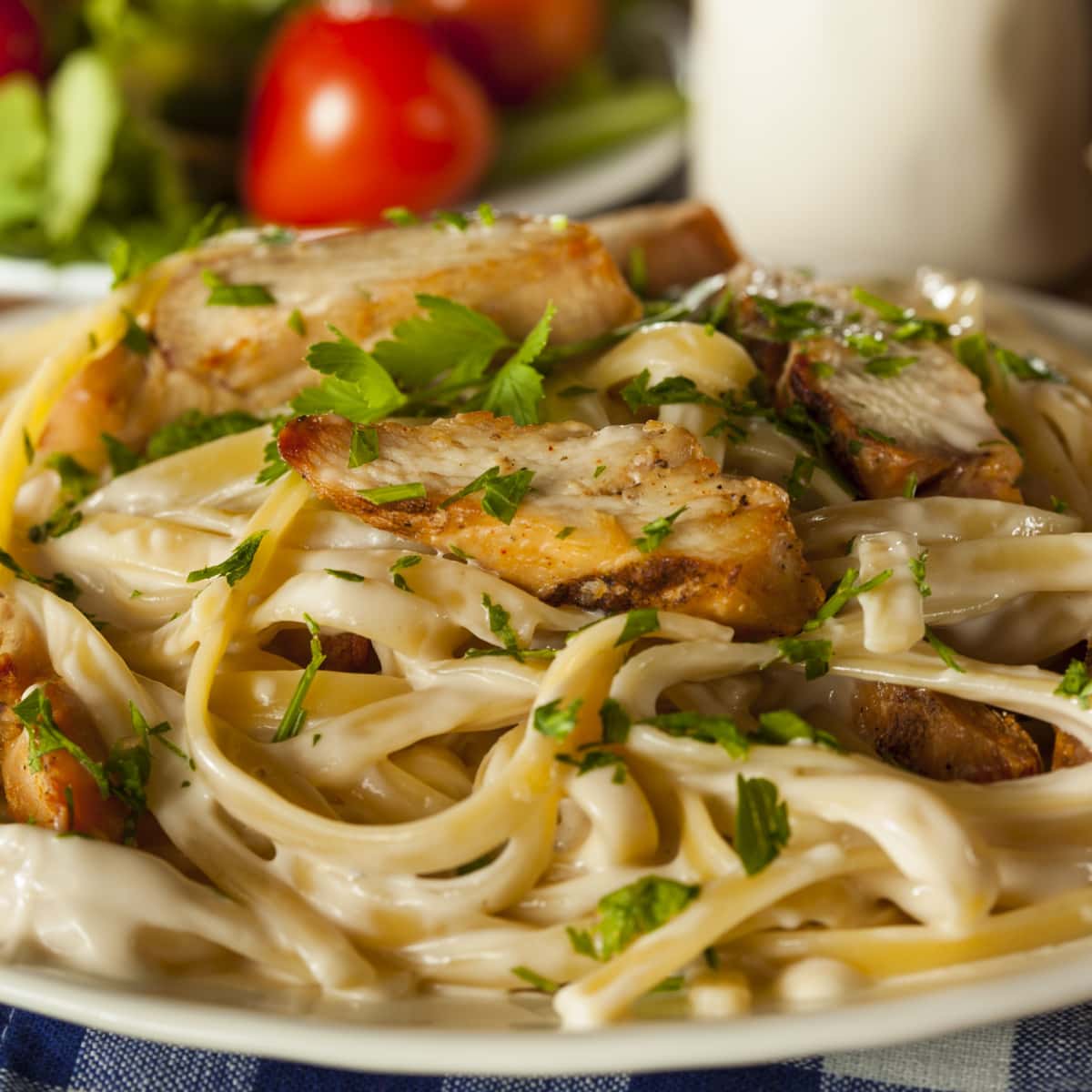 Olive Garden Chicken Alfredo Garnished With Chopped Parsley