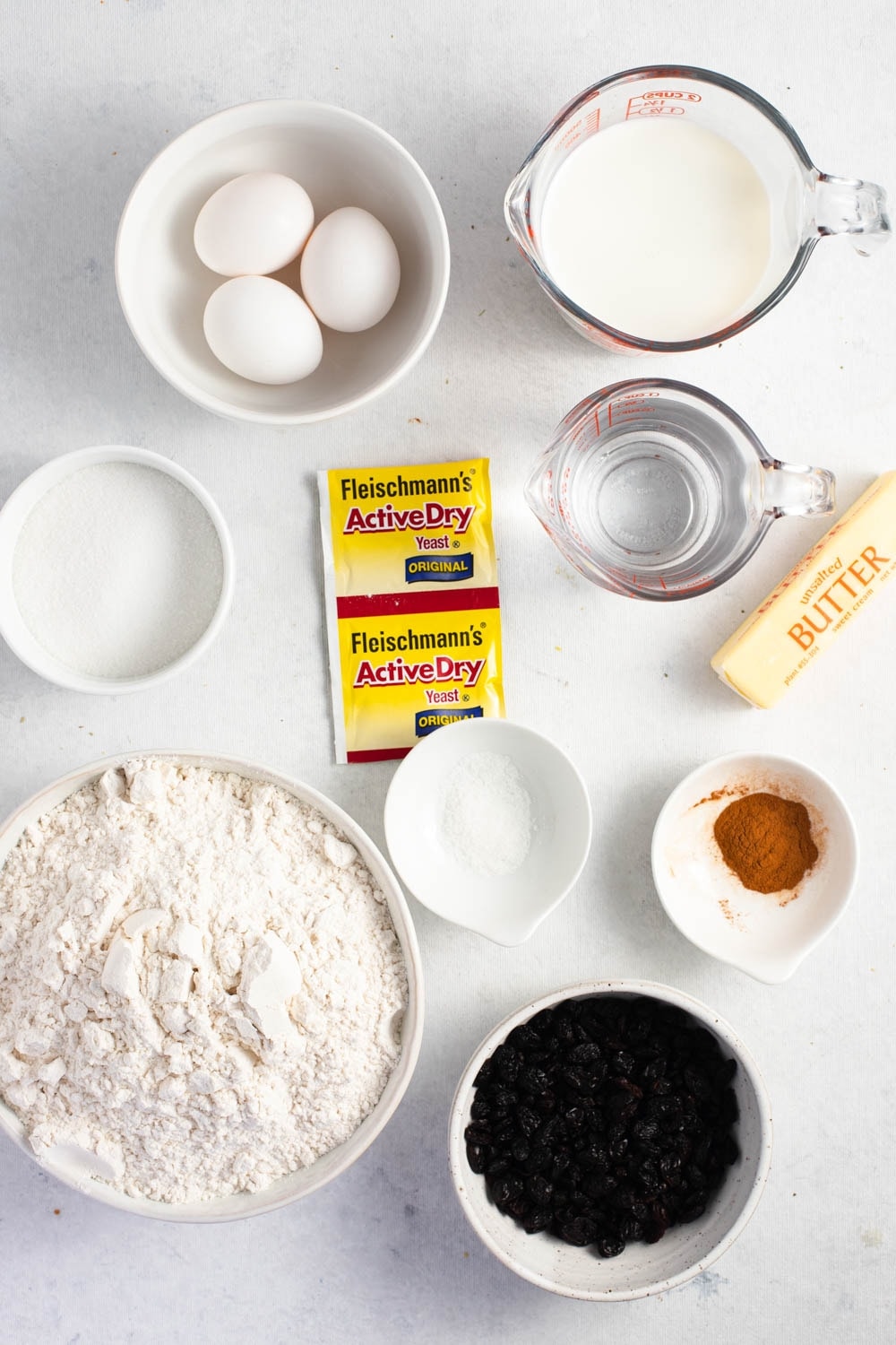 Cinnamon Raisin Bread Ingredients - Milk, Warm Water, Yeast, Eggs, White Sugar, Salt, Butter, Raisins and Cinnamon