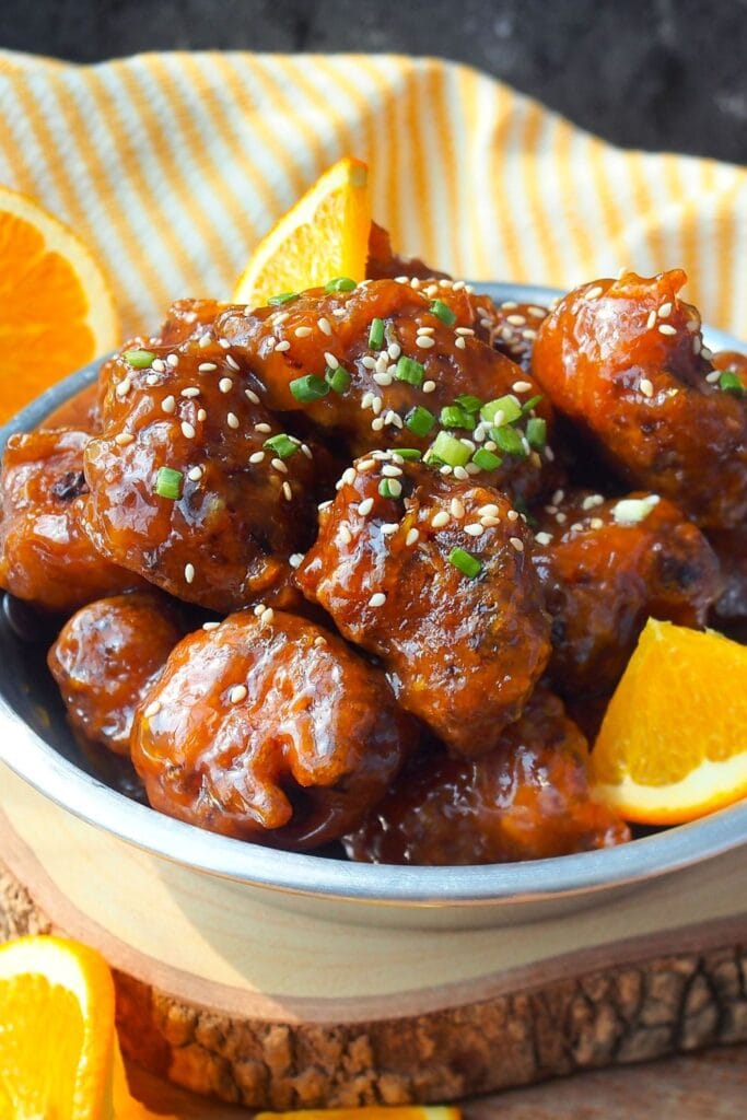 Deep Fried Orange Chicken with Sesame Seeds