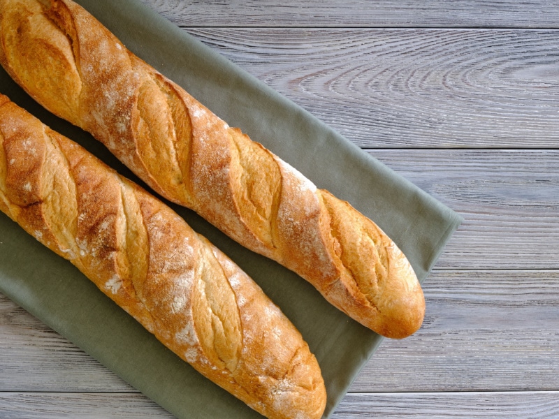 Two French Bread on a Table Cloth