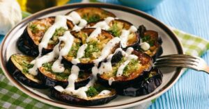 Fried Eggplant with Yogurt Sauce in a Plate