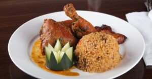 Homemade Arroz Con Gandules with Fried Chicken in a Plate