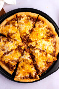 Homemade Sloppy Joe Pizza with Meat and Cheese in a Pan