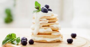 Homemade Sour Cream Pancakes with Fresh Blueberries