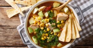 Homemade Spicy Chicken Chili with Vegetables, Tortillas and Corn