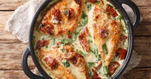 Homemade Baked Chicken with Creamy Sauce, Sun-Dried Tomatoes and Spinach