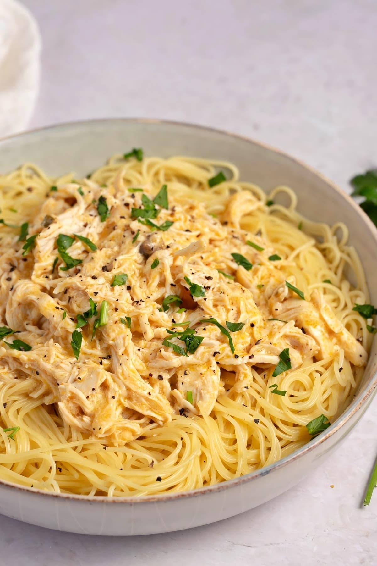 Homemade Crockpot Angel Chicken with Pasta in a Bowl