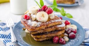 Homemade French Toast with Raspberries and Banana Slices