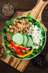 Keto Bowl with Ground Turkey, Cauliflower Rice, Paprikas, Cucumber, Kale and Pumpkin Seeds