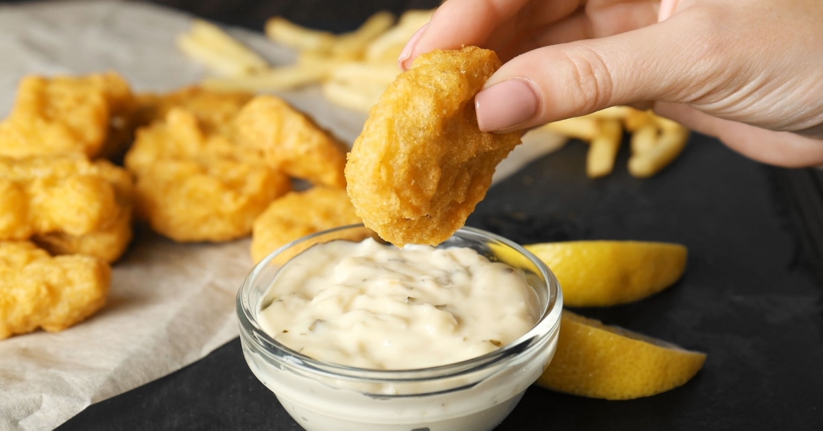 Chicken Nuggets Dipped in Mcdonald's Tartar Sauce