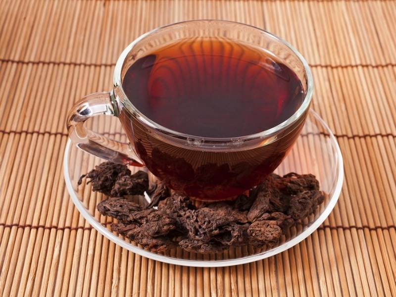 Fresh Pu-erh Tea in a Glass Mug
