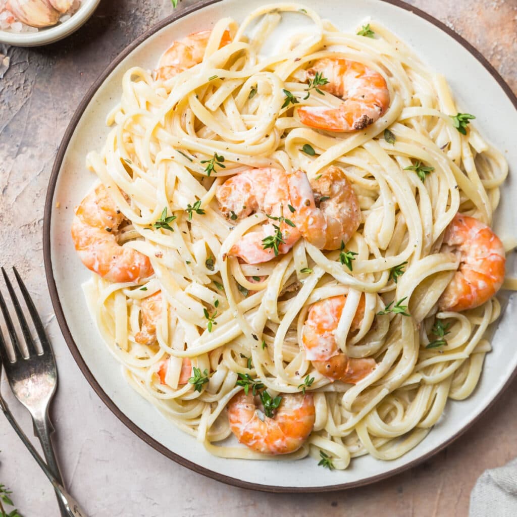 Creamy Shrimp Alfredo Served on a White Plate