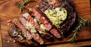 Sliced Butter Garlic Steak in a Wooden Board