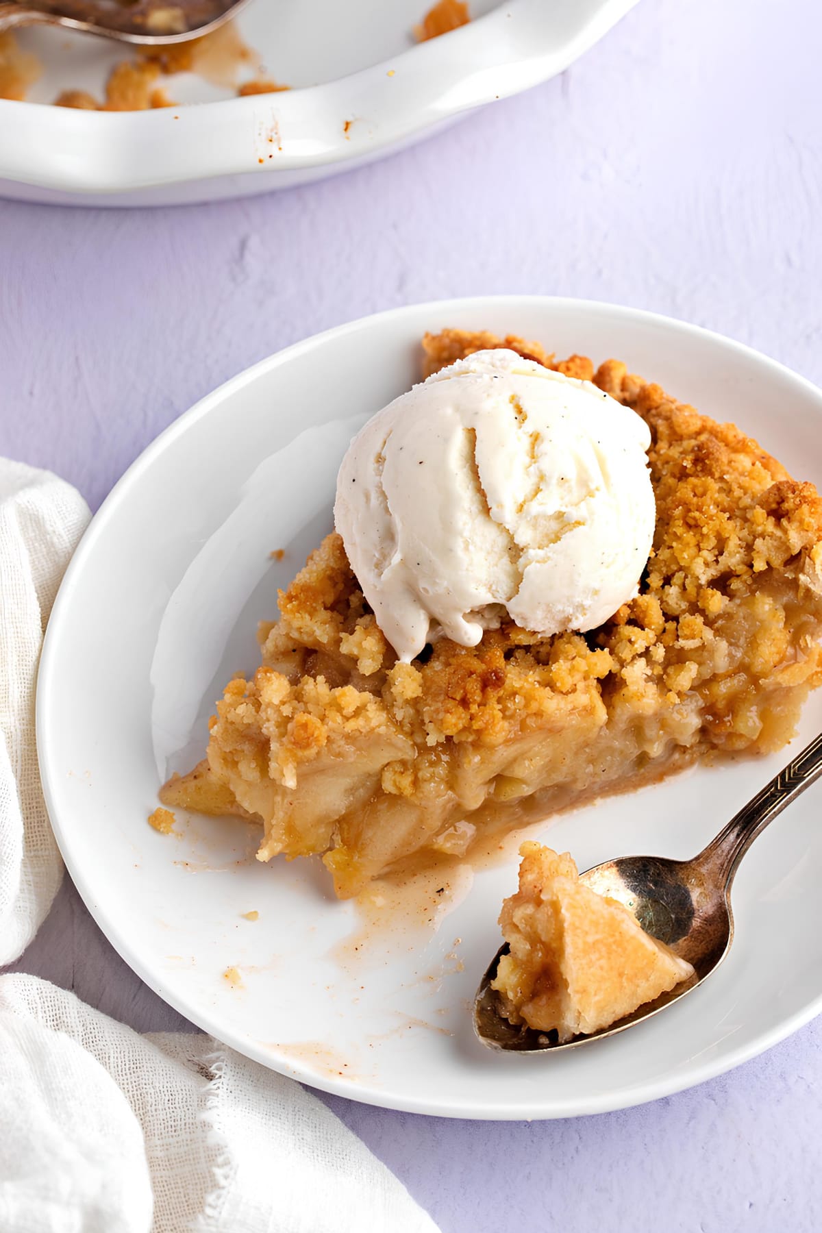 Sliced Homemade Dutch Apple Pie with Ice Cream