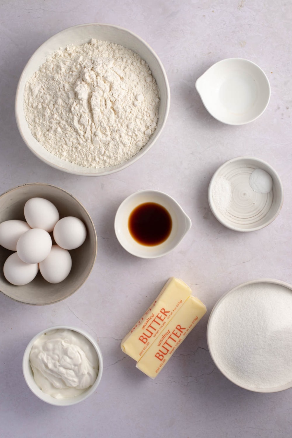 Sour Cream Pound Cake Ingredients - Vanilla and Almond Extract, Salt, Baking Soda, Egg, Flour, Sour Cream, Sugar and Butter