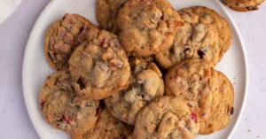 Sweet Homemade Fruticake Cookies with Cherry and Pineapple on a White Plate