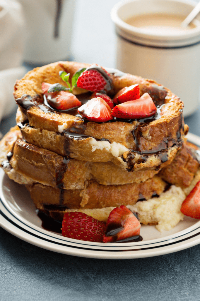 French Toast with Strawberries and Chocolate Syrup