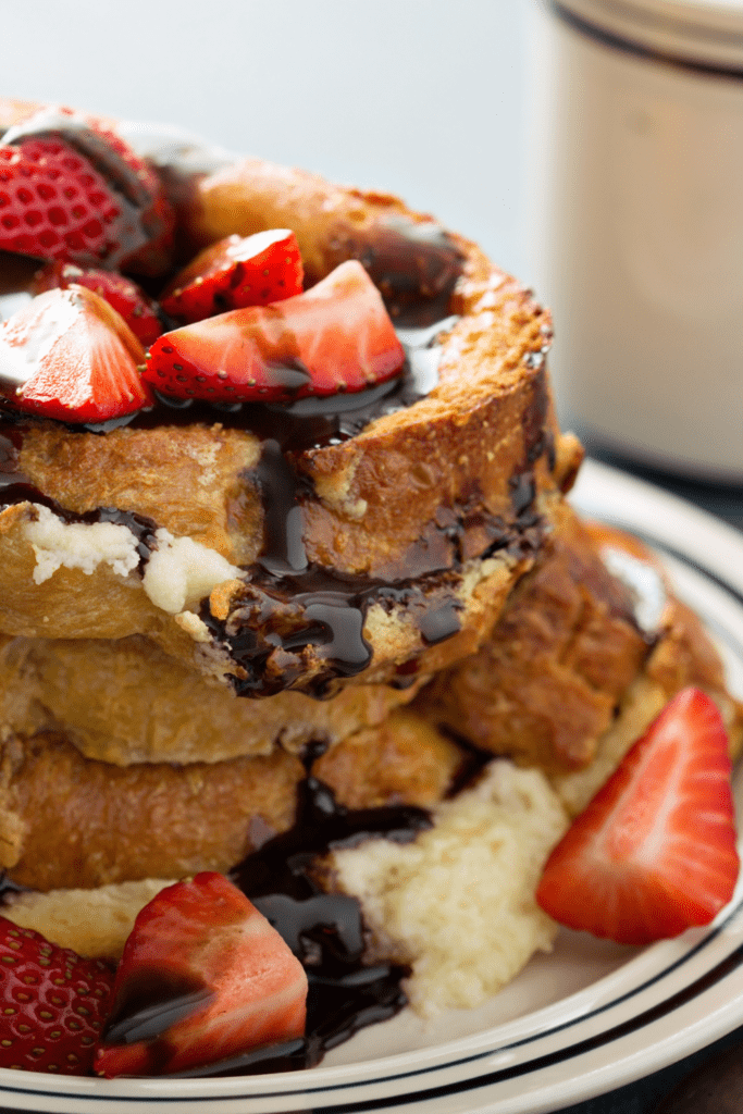 French Toast With Strawberries And Chocolate Syrup